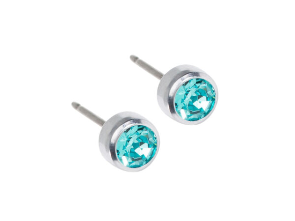 Latched & Bloom A pair of Silver Titanium Turquoise Crystal Bezel Earring Studs-5mm, isolated on a white background. Pediatric and Postpartum Care